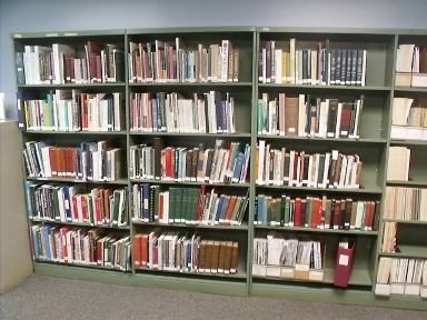 [photo: first three sections of shelving]